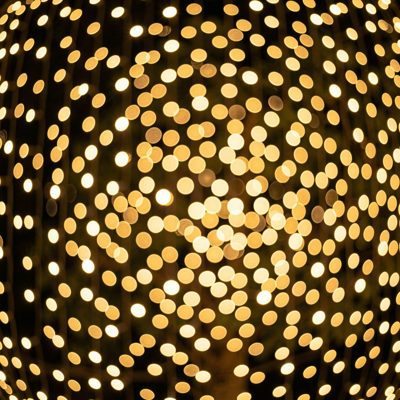 a bokeh field of small golden lights