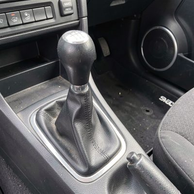 a gear stick and handbrake in a manual car