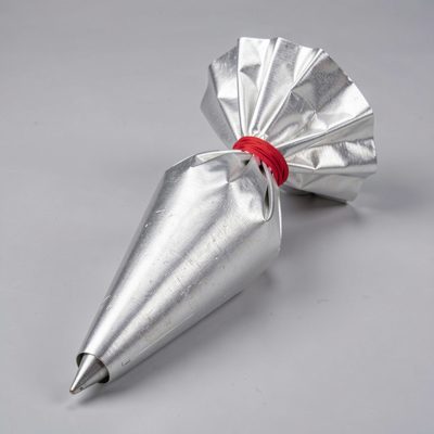 a pastry bag fitted with a star nozzle