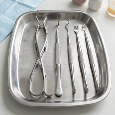 dental surgery tools laid out on tray