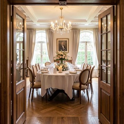 a dining room seen from the doorway at service time