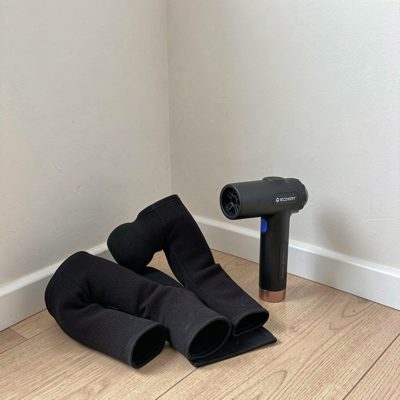 recovery corner with compression sleeves and massage gun