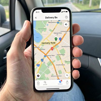 a delivery route map on a driver's phone