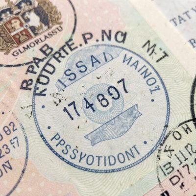 a passport stamp page photographed close up